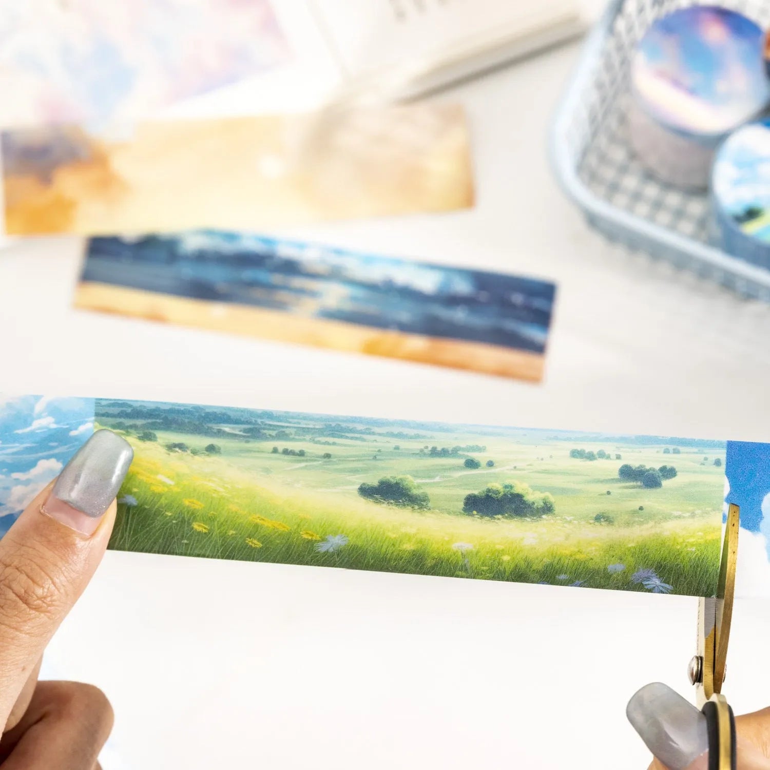 Roll of Japanese paper washi tape with sky theme designs showing colourful cloud pattern