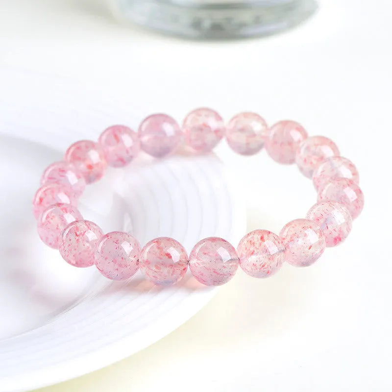 White strawberry quartz crystal bracelet with 10-10.8mm geometric beads