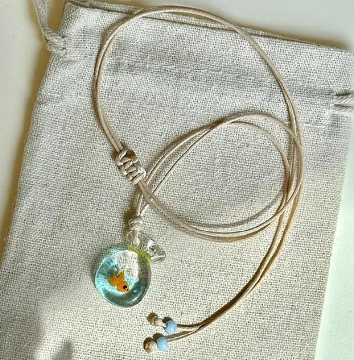 Women's necklace with coloured glaze skirt joker pendant on cotton linen clavicle chain