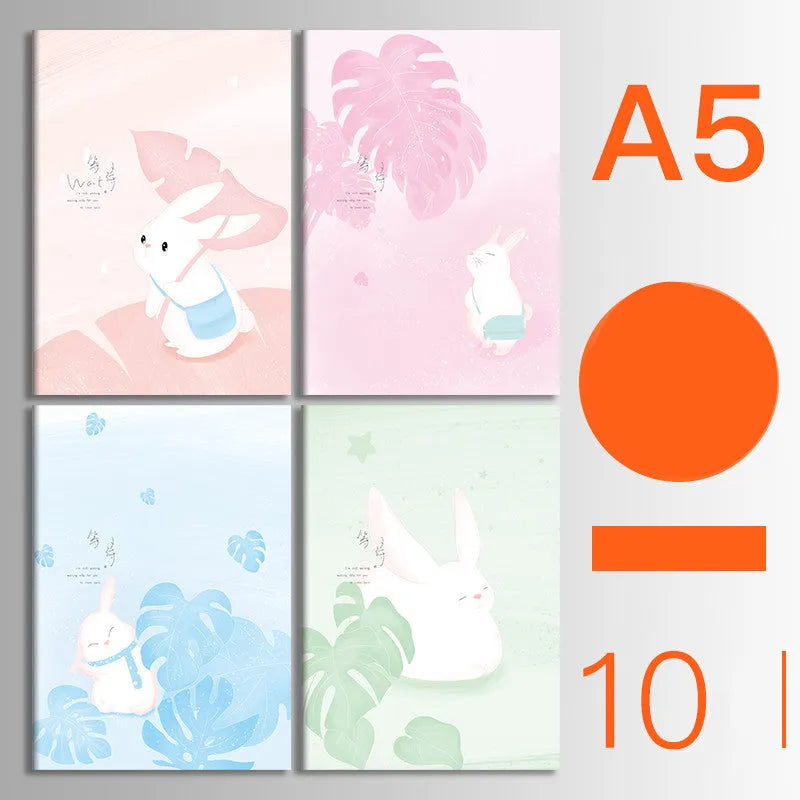 Set of 10 thread-bound softcover notebooks in various designs including kraft paper and printed patterns
