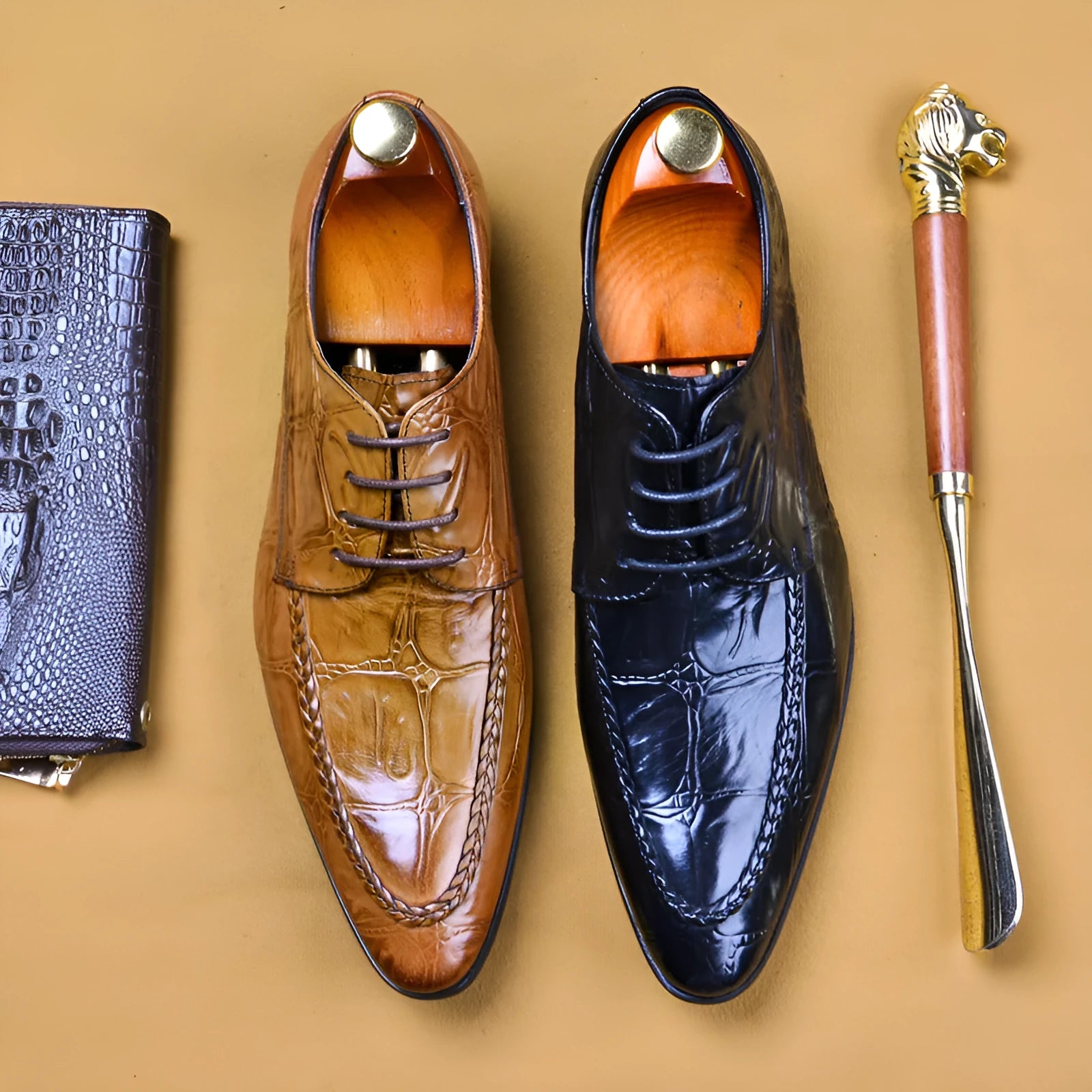 Men's black leather casual shoes with alligator pattern texture and a silver horse bit buckle