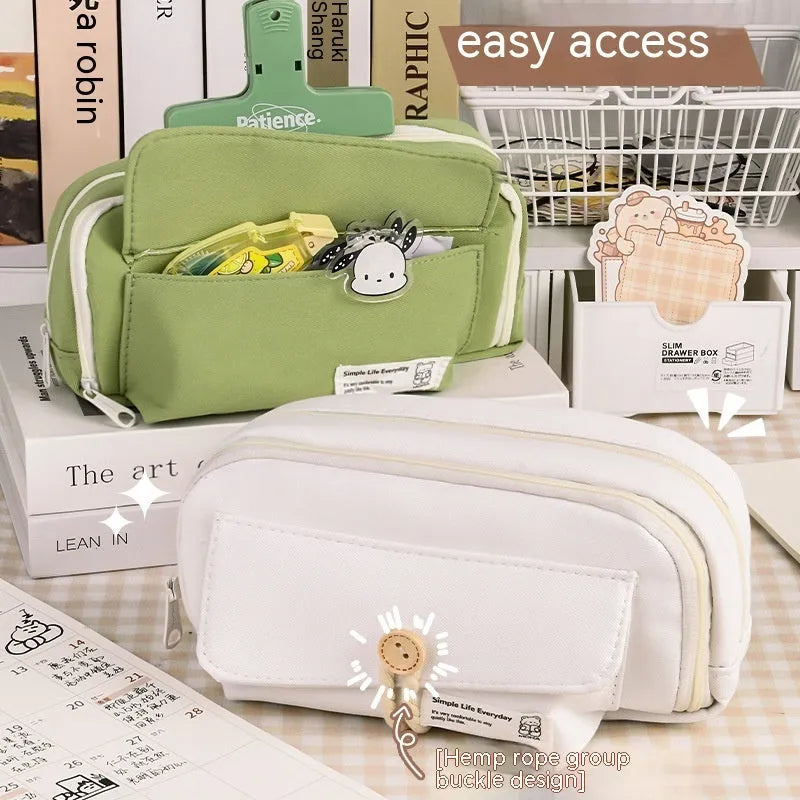 Large Korean-style canvas pencil case for girls in green, holding multiple pens.