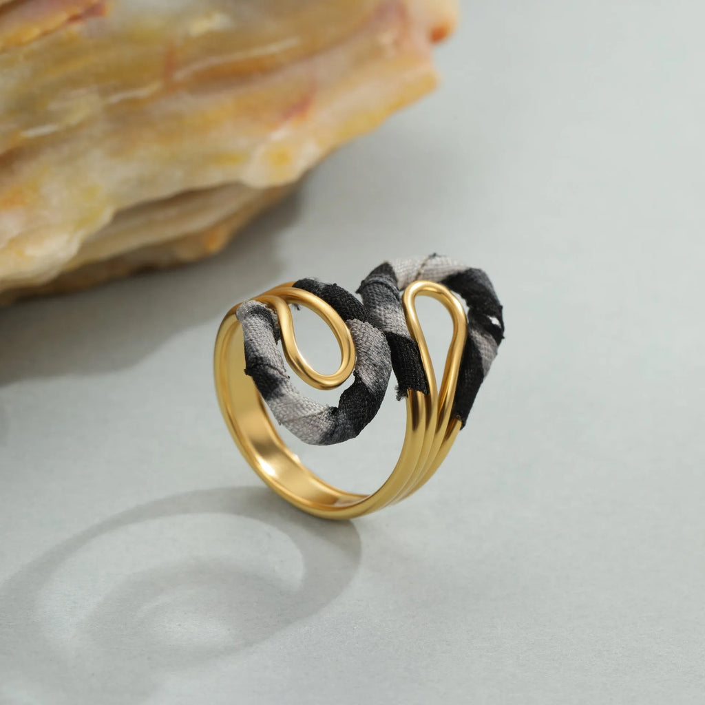 Leopard print stainless steel open mouth ring in heart, star, or geometric shape.