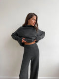 Women's acrylic suit set with side-slit sweater and trousers in solid colour