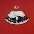 Red holiday pet scarf with bell motif wrapped around dog's neck for Christmas