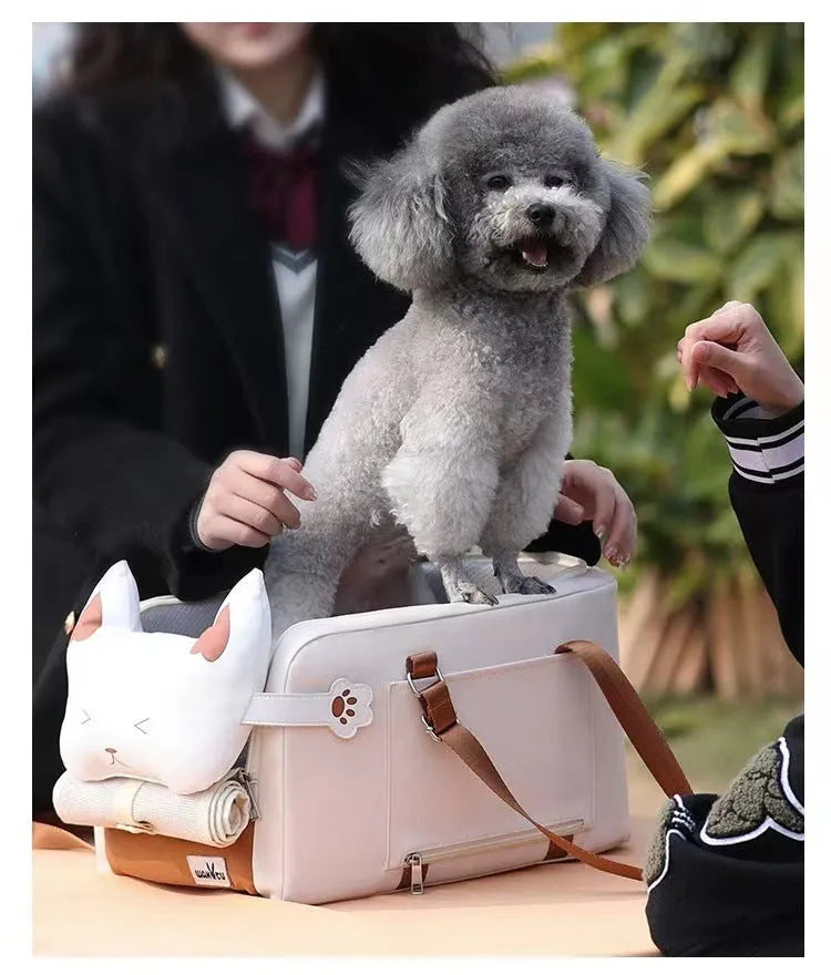 Hard-sided beige pet carrier with one shoulder strap, dimensions 43x25x22.5cm for pets to 15kg