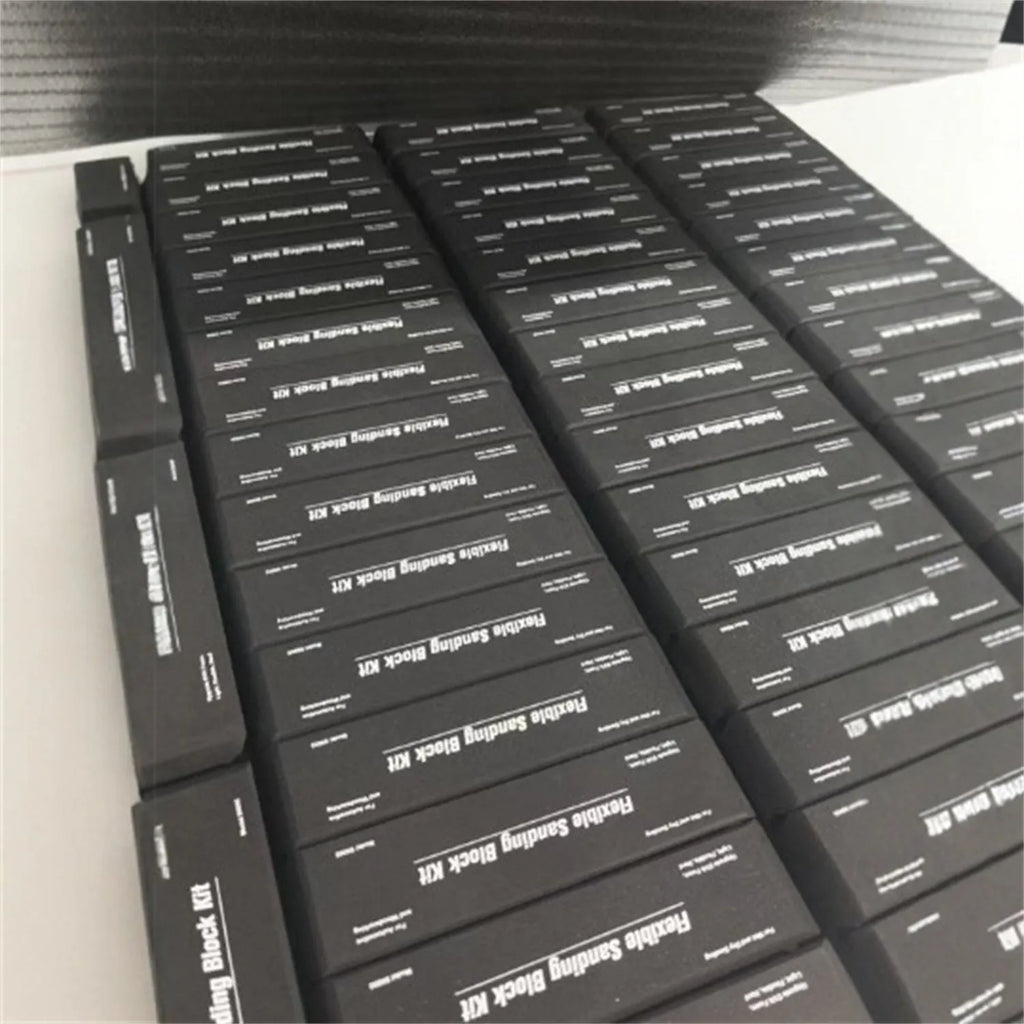 Set of seven black metal frosted blocks for craft and modelling work.