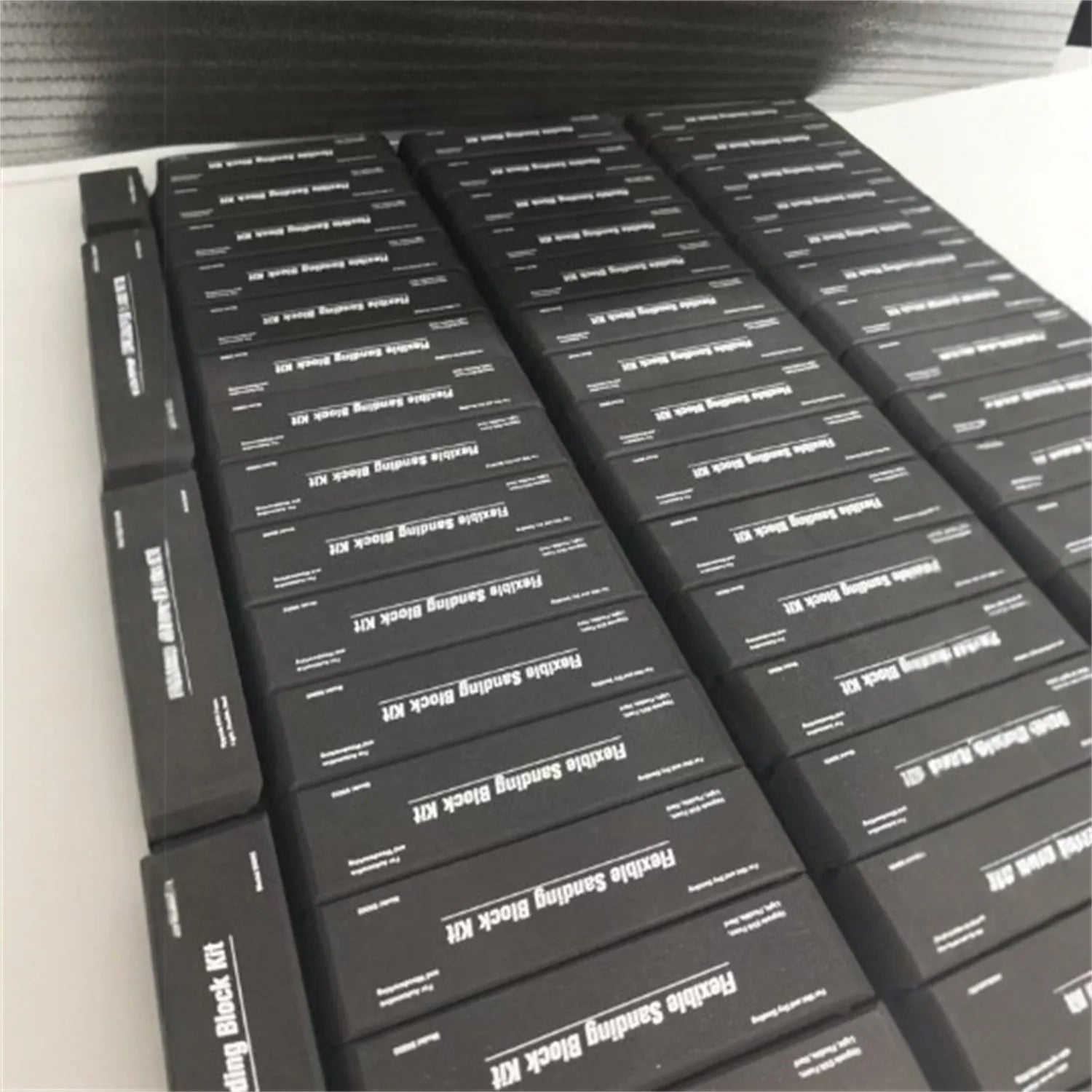 Set of seven black metal frosted blocks for craft and modelling work.