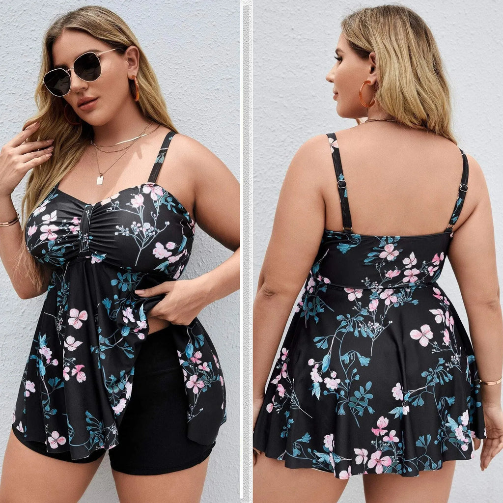 Women's one-piece swimsuit with a split colour floral print, shown in an extended size.