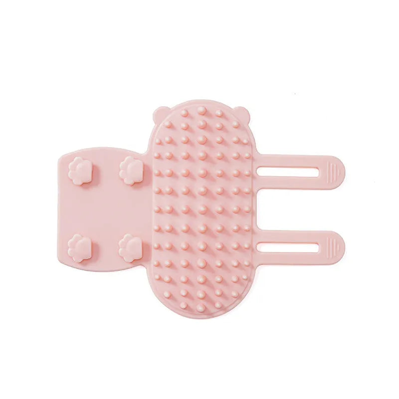 Silicone pet grooming massage comb with rounded teeth and adjustable strap for table leg mounting