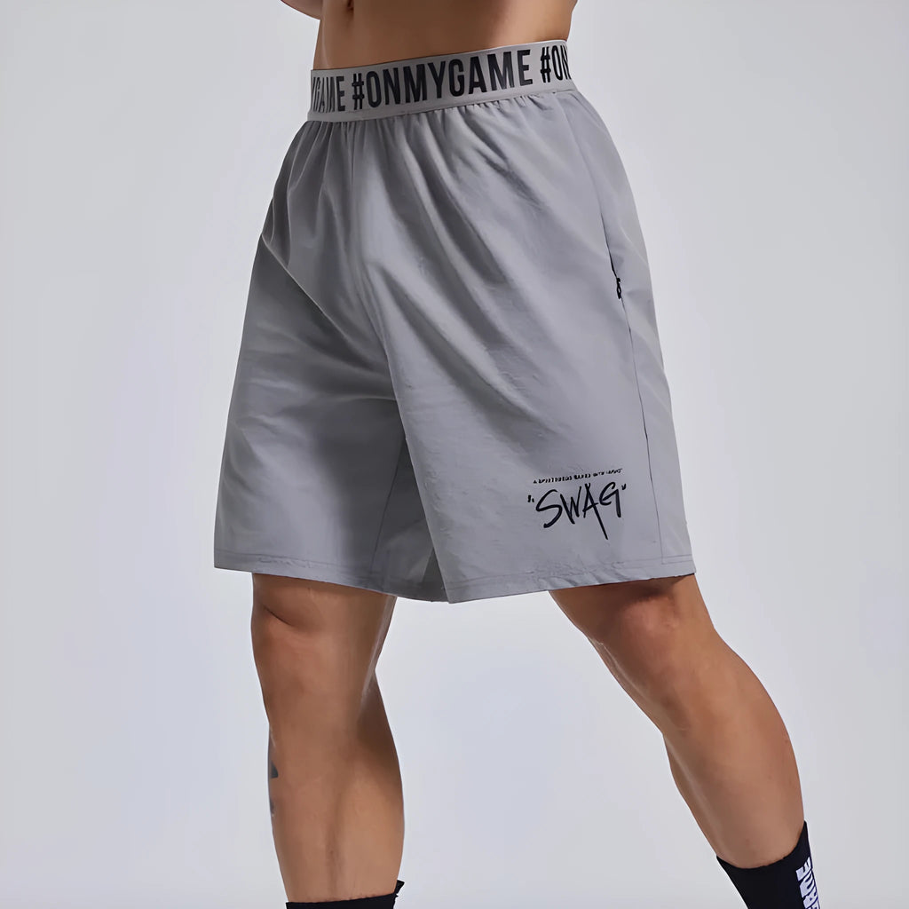 Men's black loose sports shorts with elastic waistband for workout and running
