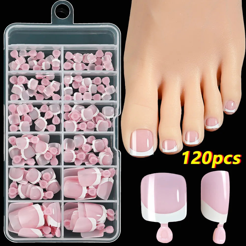 120-piece box of French white tip false toenails in nude colours, square short shape.