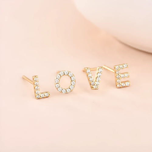 Gold plated brass alphabet letter earrings with zircon detailing showing A-Z character range