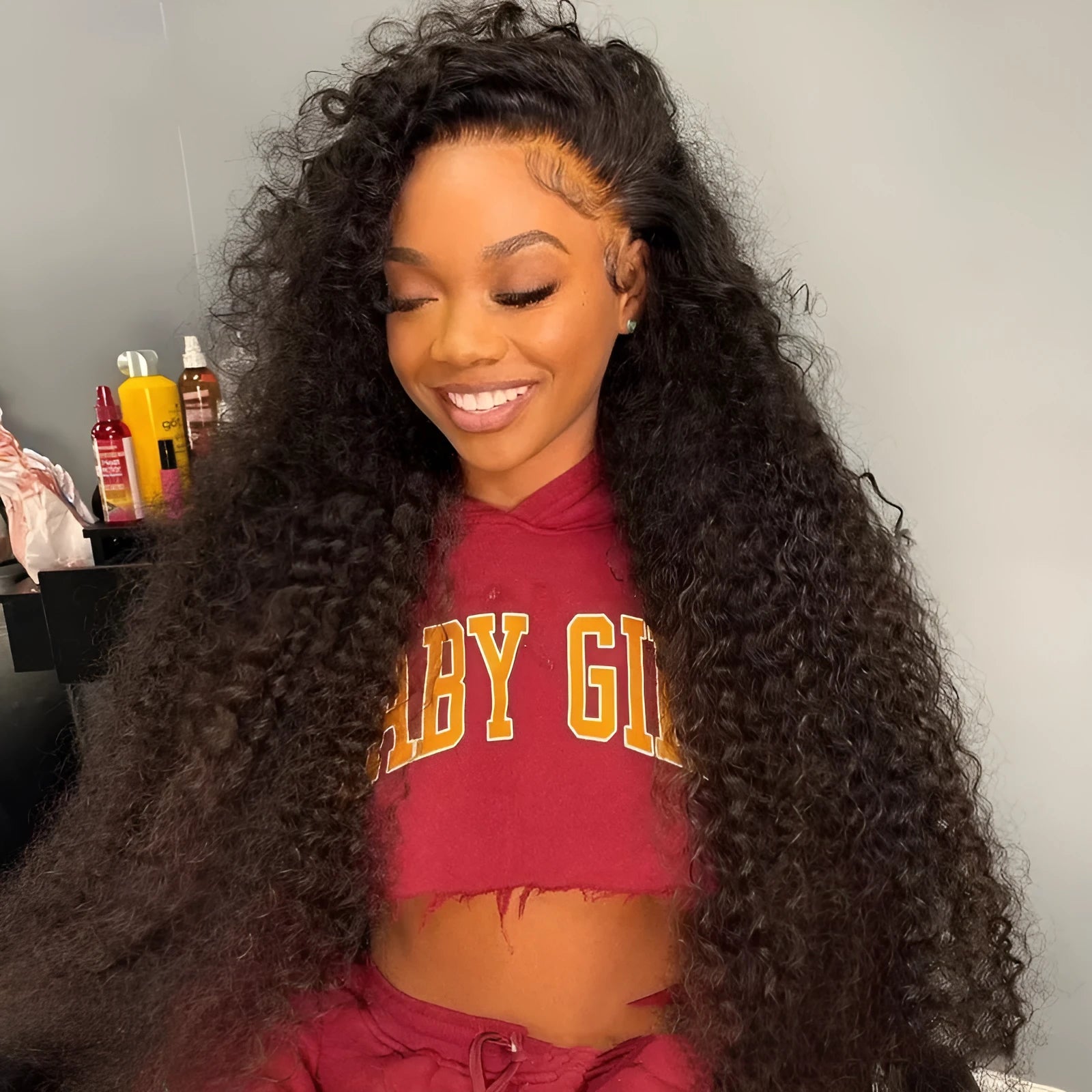 Jerry curly human hair lace front wig in medium length with half lace construction