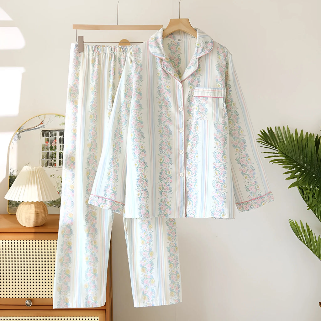 Women's striped cotton gauze long-sleeved top and matching trousers two-piece lounge set laid flat.