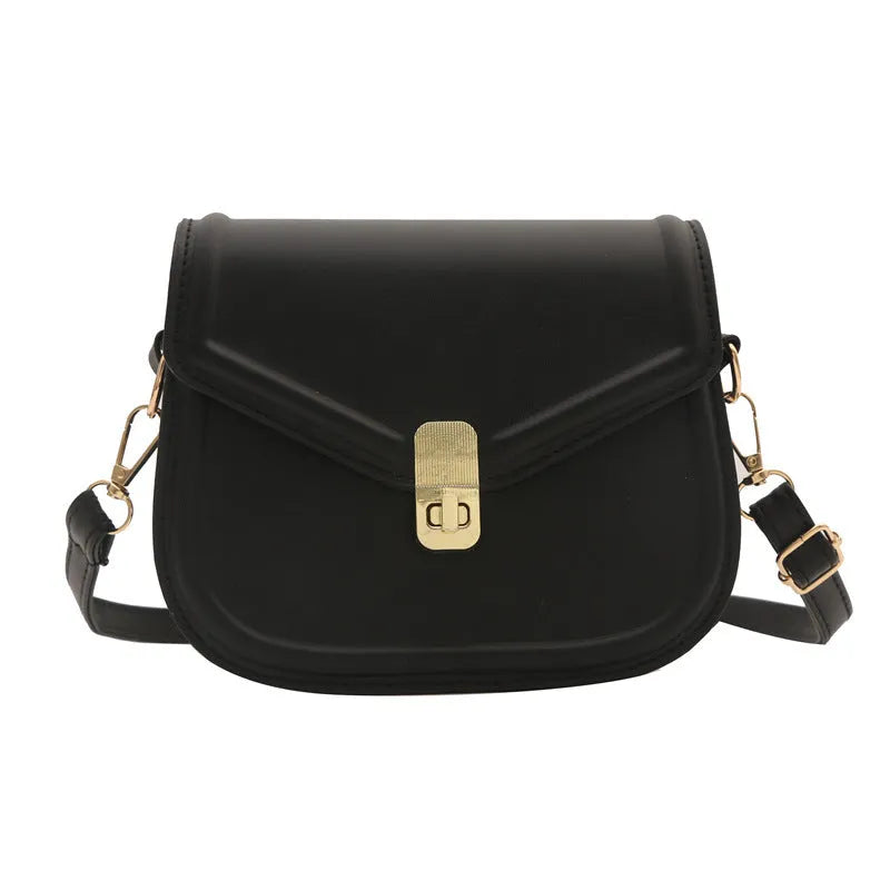Soft textured PU leather messenger bag with clamshell opening, shown in a horizontal square shape.