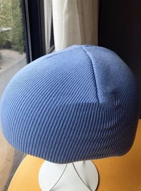 A size L decorative cover for a ski helmet, shown in one of fifteen available colour options.