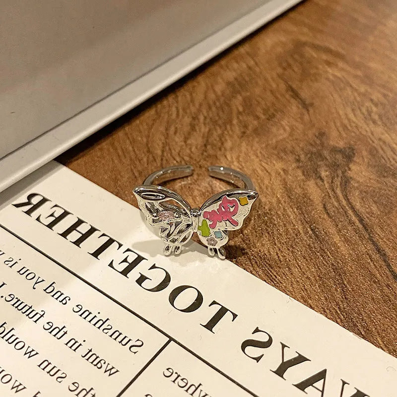 Butterfly design copper ring with oil-drip textured finish in women's jewellery