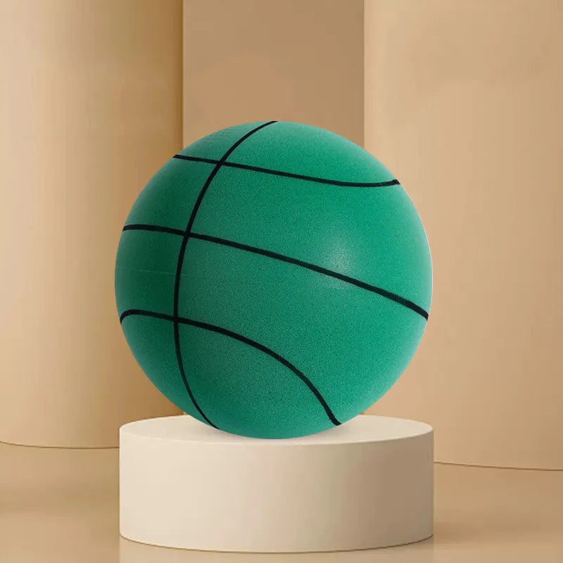 Silent high density foam sports ball in assorted bright colours next to a basketball frame.