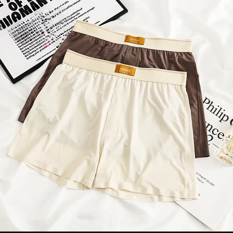 Men's ice silk boxer shorts in solid colours showing loose fit and mid waist design