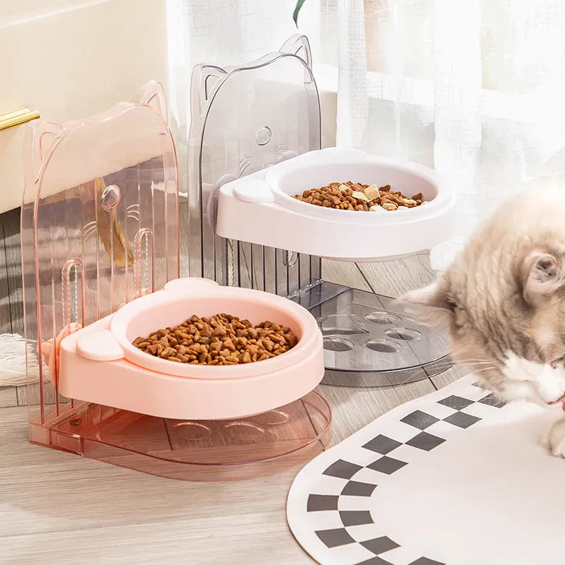 Grey cat feeding bowl with cat ears design and adjustable height mechanism on removable hanging cage