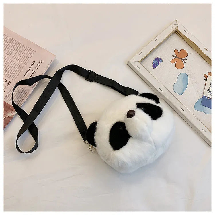 Plush panda head crossbody bag with cylindrical shape measuring 18cm wide