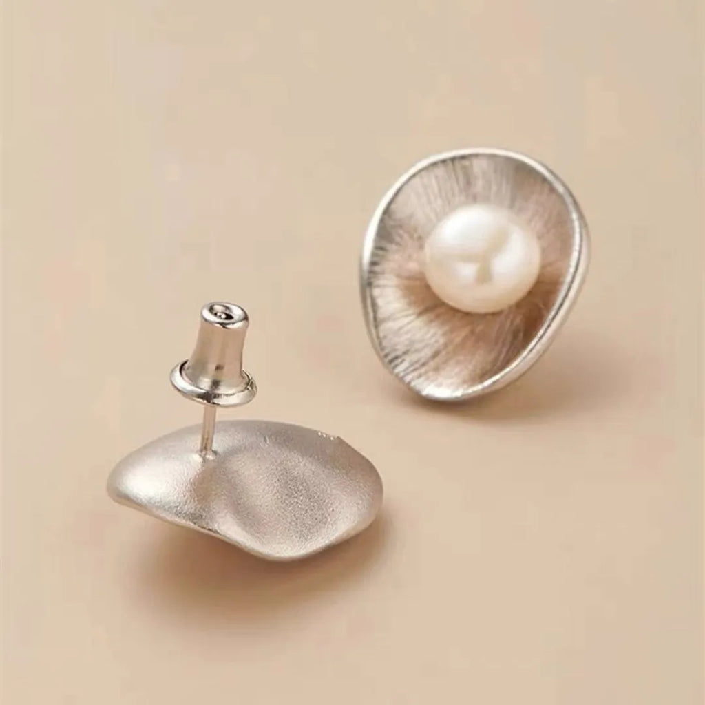 Geometric pearl sterling silver earrings with gold electroplating and needle posts