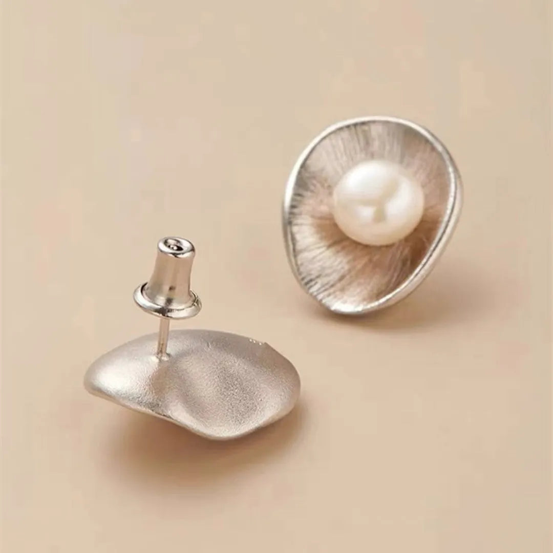 Geometric pearl sterling silver earrings with gold electroplating and needle posts