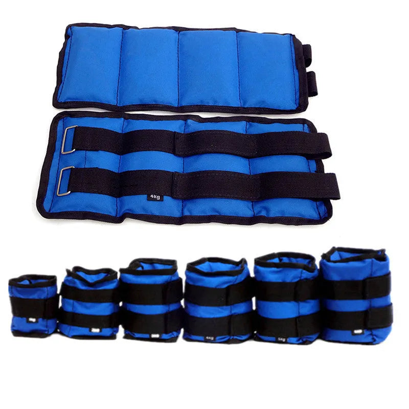 Pair of Oxford cloth legging sandbag weights for athletic training, shown with ankle strap.
