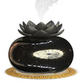 Pure black round USB aromatherapy humidifier with ultrasonic mist outlet