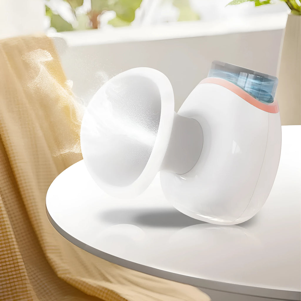 White portable eye humidifier with USB charging cable on wooden table