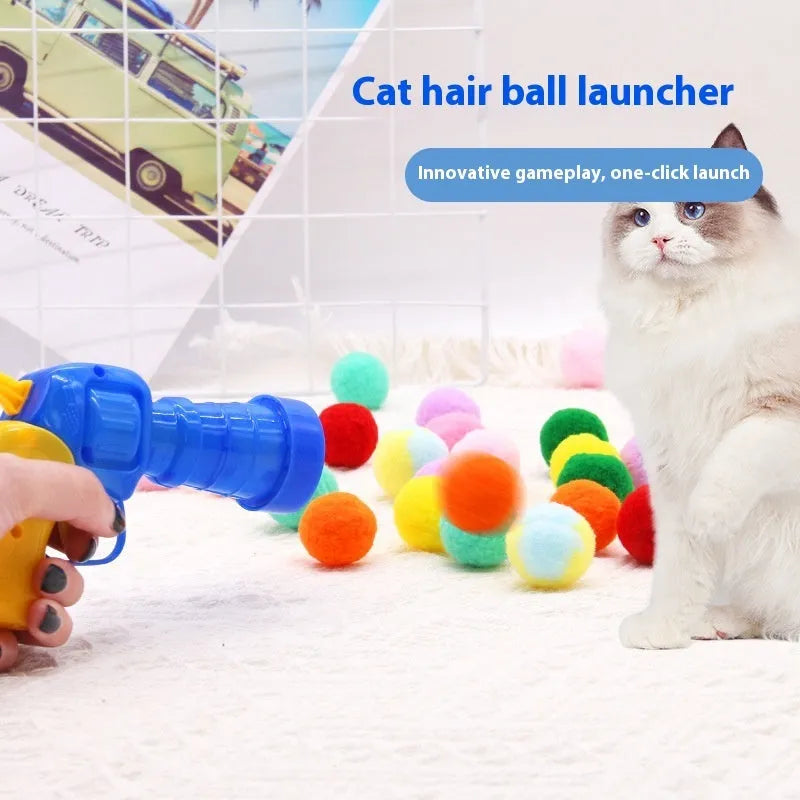 Pet toy launcher gun with assortment of soft plush balls for dog fetching games