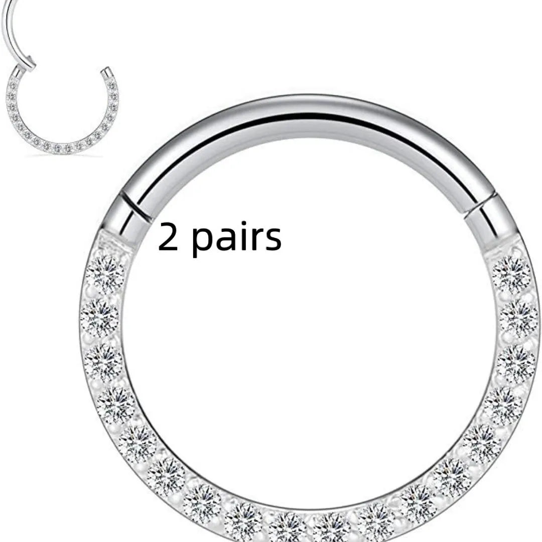 Stainless steel seamless nose rings showing steel, gold, rose gold, and black electroplated finishes with round design