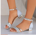 Women's plus size Roman style sandals with rhinestone fish mouth toe and buckle fastening on a rubber sole.