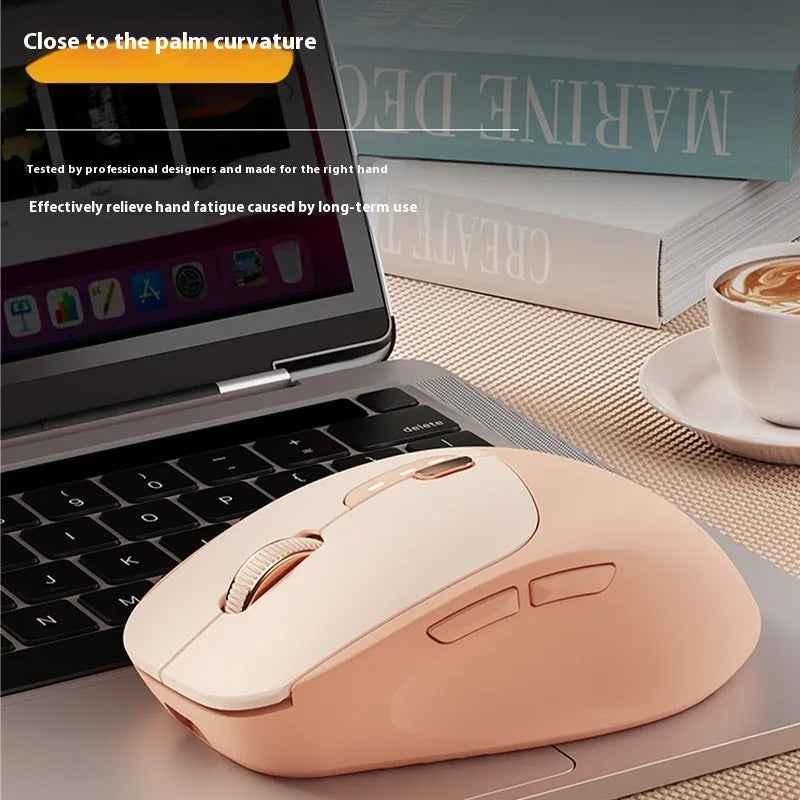Mute dual-mode wireless Bluetooth computer mouse in Matcha Green colour on a desk.