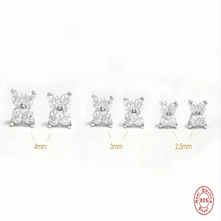S925 sterling silver stud earrings with a small crystal flower design in gold or platinum plating.