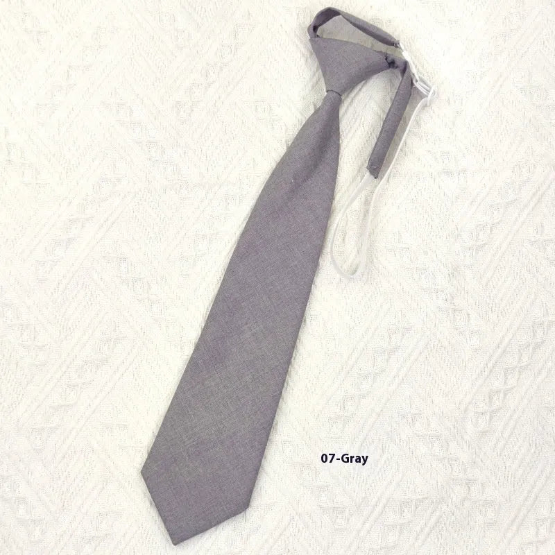 Solid navy blue men's cotton bow tie with arrow type styling measuring 35cm by 7cm