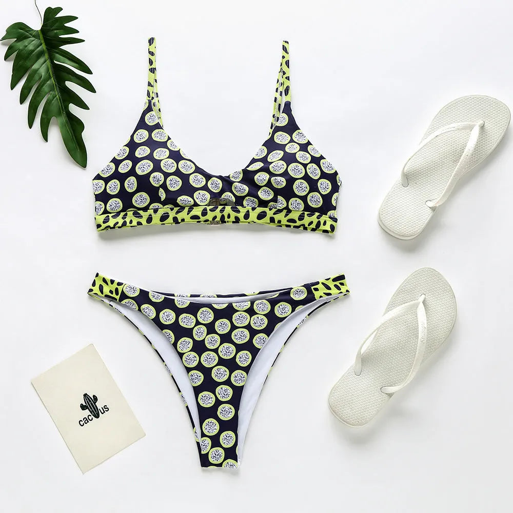 Women's bikini swimsuit in polyester, showing black and white dots and red and white stripe colour options.
