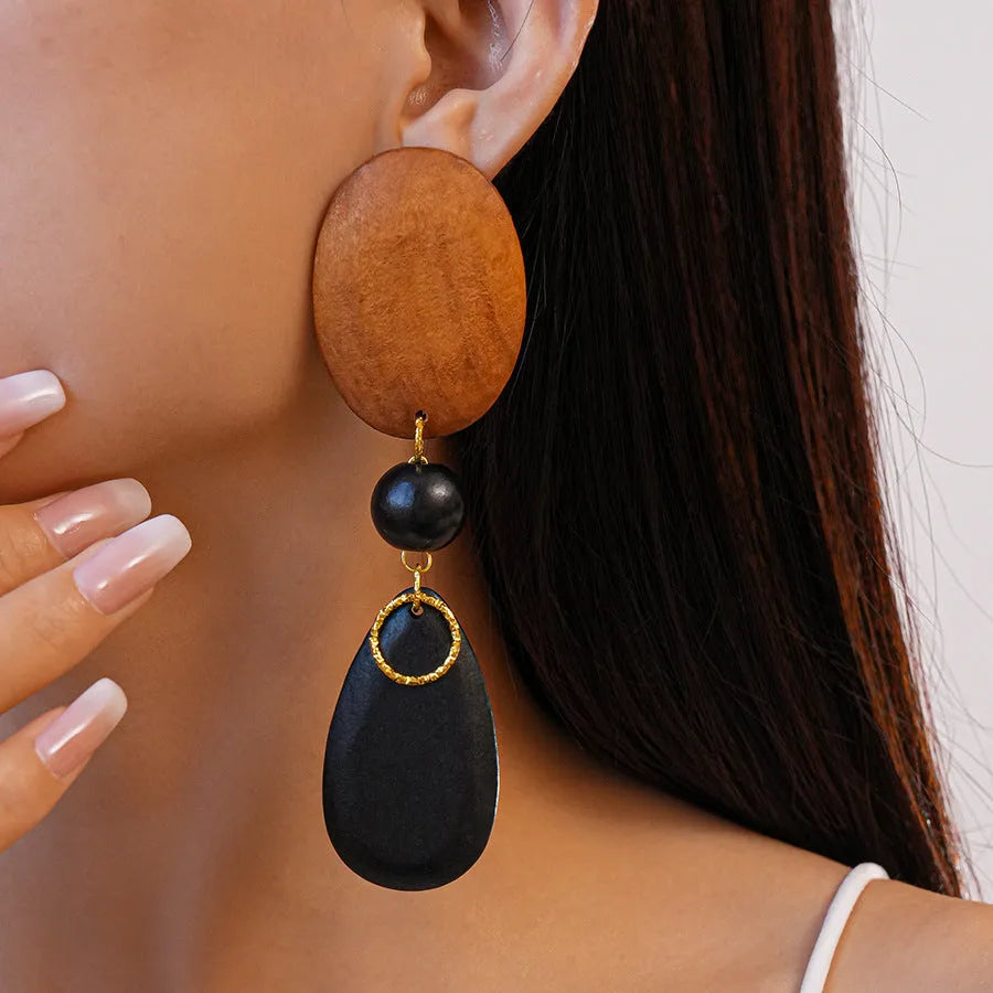 Manual wooden retro earrings with ellipse design in silver brown black colour