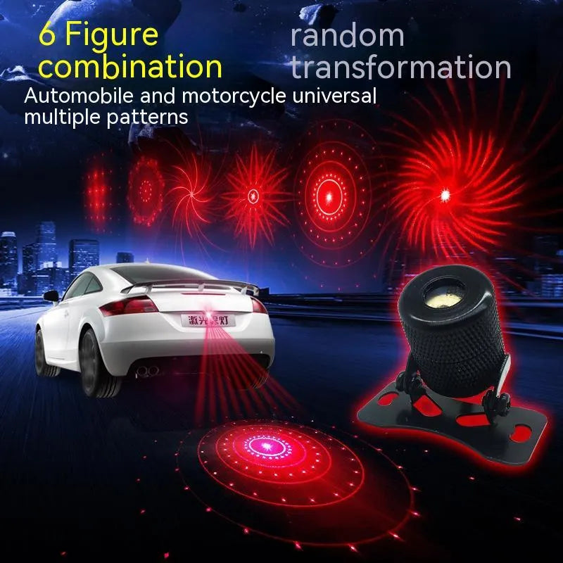 Universal vehicle laser fog lamp in aluminium housing with red laser, shown with screws and mounting tape.