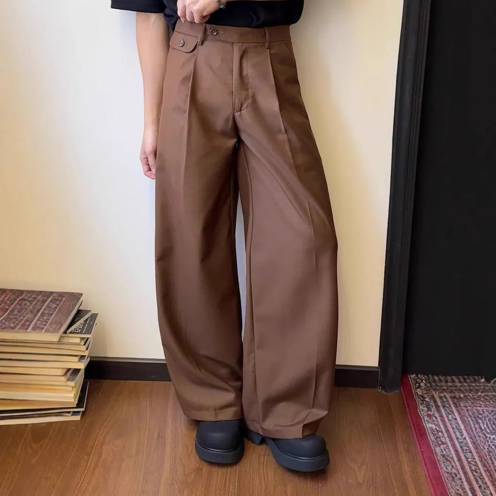 Men's brown straight-leg casual trousers with wide-leg drape fit on hanger