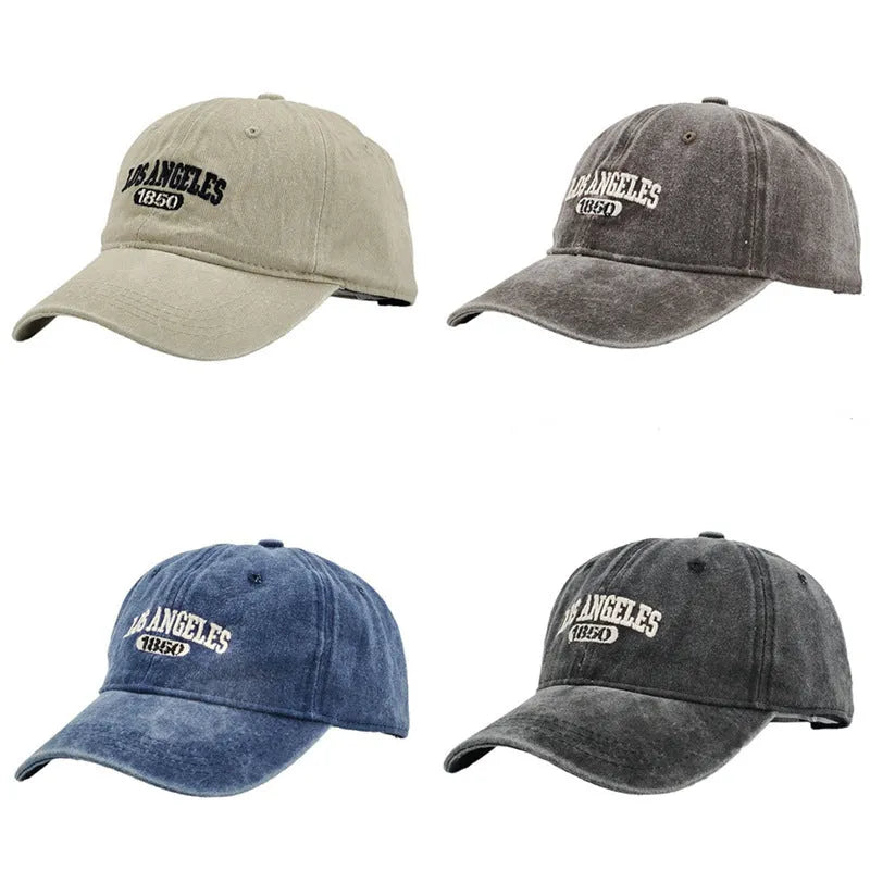 Retro peaked cap with distressed letter embroidery and adjustable sizing in conical crown design