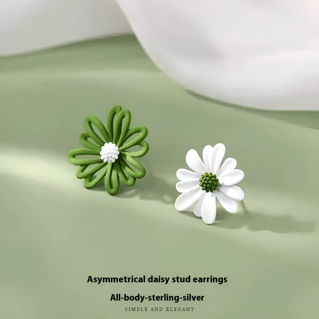 A pair of cartoon-style flower stud earrings in alloy, shown in a two-tone colour option.