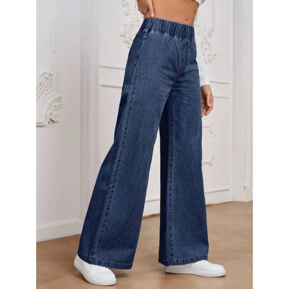 Plus size light blue washed denim jeans with wide leg straight cut and zip fly