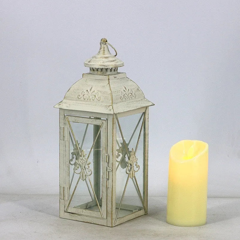 European black and white wrought iron floor-standing storm lantern with tempered glass in three sizes for courtyard decoration.