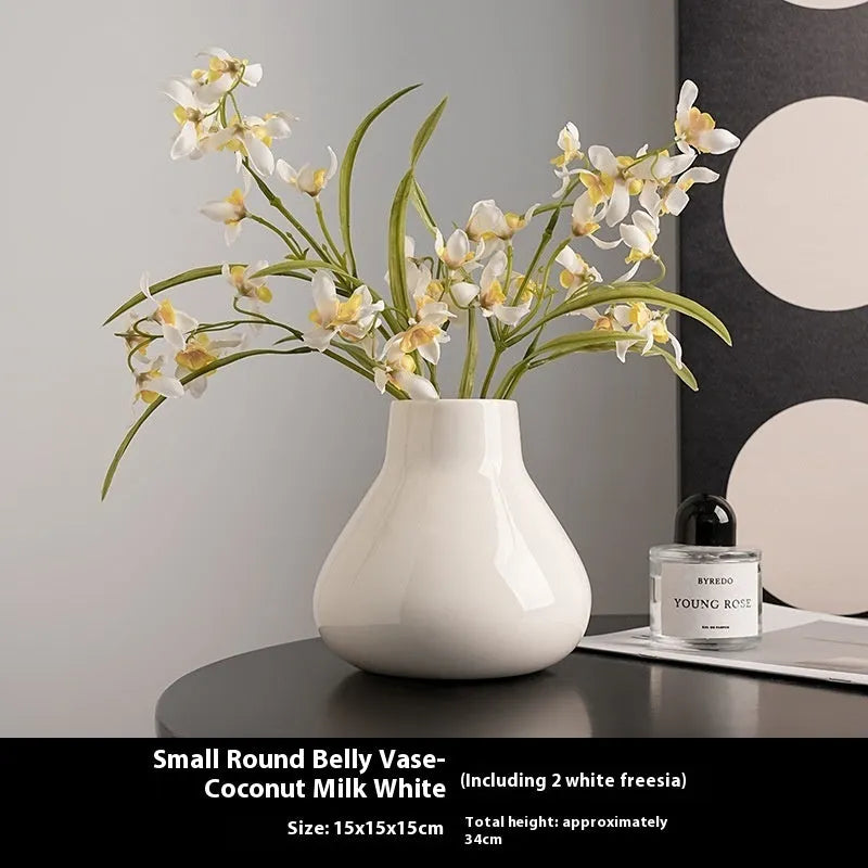 Modern black ceramic vase set with artificial white orchid flowers for home decoration