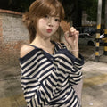 Dark blue Korean-style oversized women's t-shirt with embroidery and stripe details on long sleeves