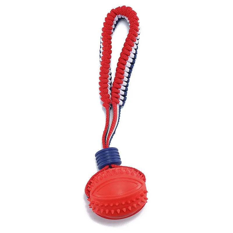 Natural rubber dog ball with rope toy in blue or red featuring textured surface for teeth cleaning