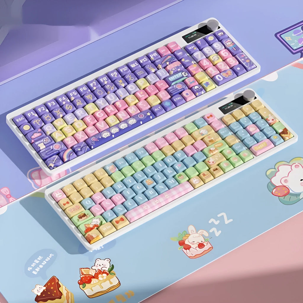 Black Iron Cow themed mechanical keyboard with RGB backlighting on a desk next to a laptop.