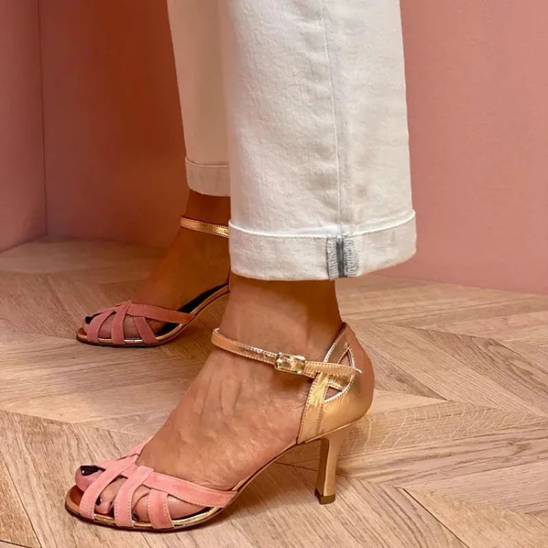 Peep toe sandals with buckle strap and herringbone toe detail, shown with knee-high socks, in black, green, pink, or purple.